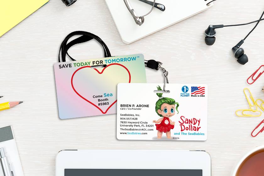 Example of Platinum Mirror-Like Reflective Custom Trade Show Badge for Sandy Dollar and the Sea Babies Cartoon