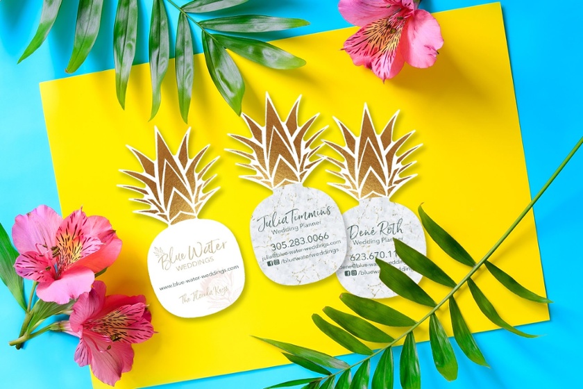 Custom business cards in a pineapple shape from Plastic Printers