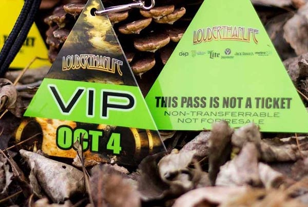 Example of Custom Triangle Shaped VIP Passes by PlasticPrinters.com