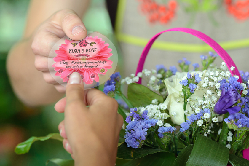 Punch cards with a floral design for a floral shop