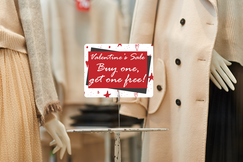 Custom signage advertising a Valentine's Day sale